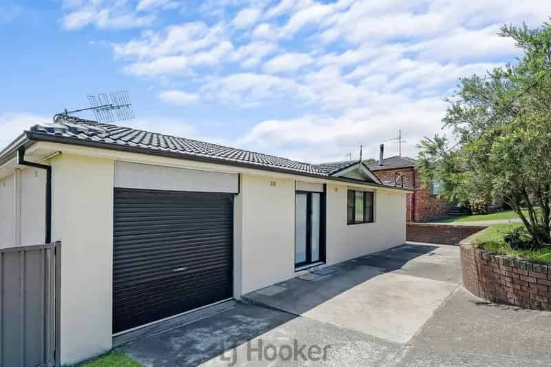 Buy modern home with four bedrooms and outdoor living in central location