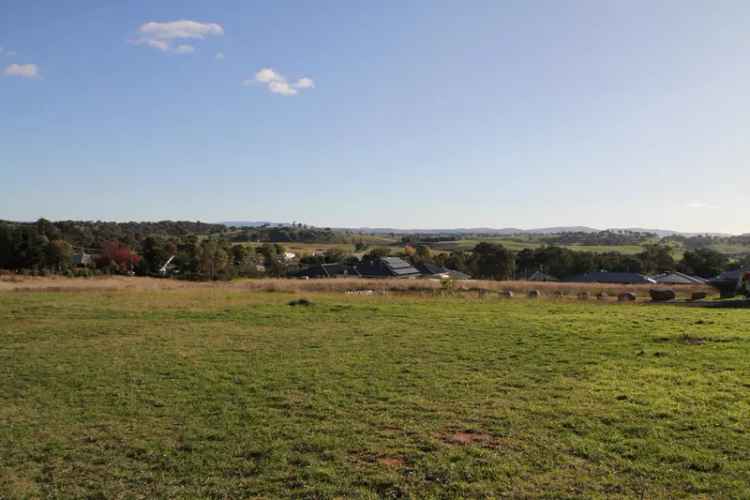 Build Your Dream Home: 769.9m2 Vacant Block with Town & Mountain Views