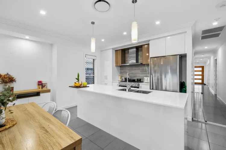 Discover Modern Family Living at 7 Cascade Street, Pimpama