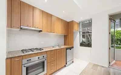 Lease Modern Studio Apartment in Crows Nest with Balcony and Kitchen