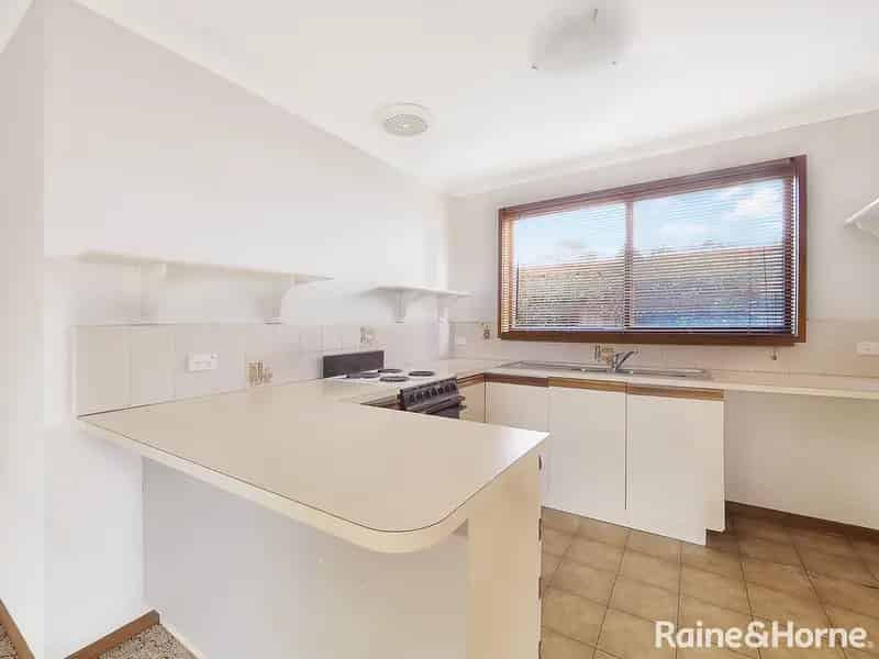 Buy house in quiet street with three bedrooms and low maintenance