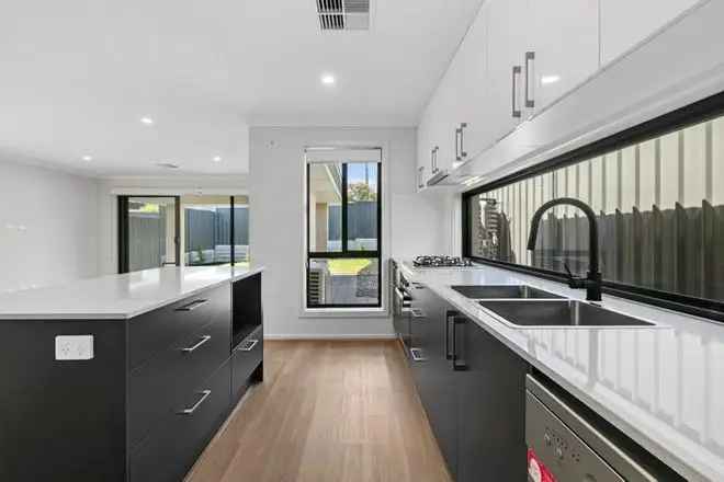 4 Bed 2 Bath Modern Home in Morphett Vale