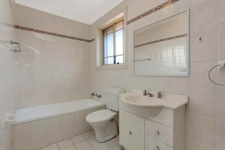 Lease Red Brick Townhouse in Castle Hill with Modern Features