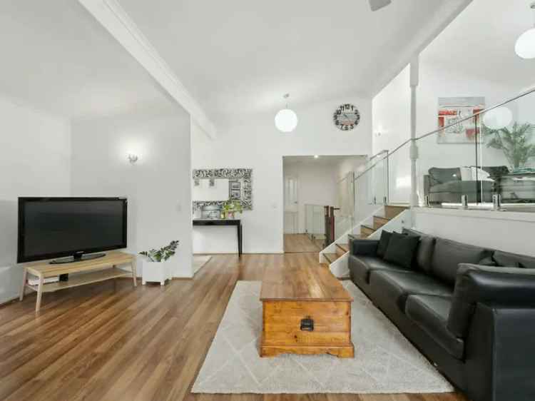 Buy family home in Elanora with versatile design and close beach access