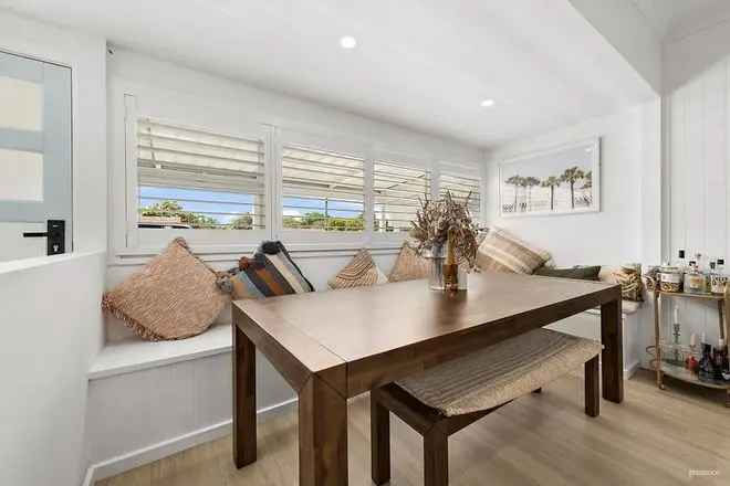 Coastal Vibe Home Renovation Dual Aspect Windows Plantation Shutters