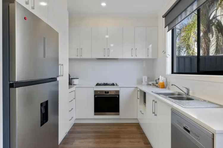 Buy Modern Townhouse in Port Adelaide with Four Bedrooms and Courtyard