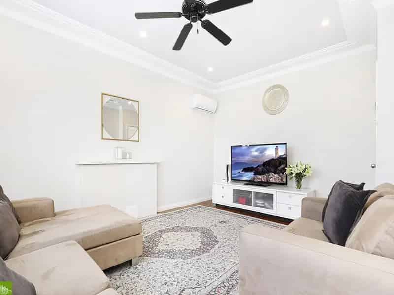 Lease five-bedroom home in Corrimal with garage and backyard