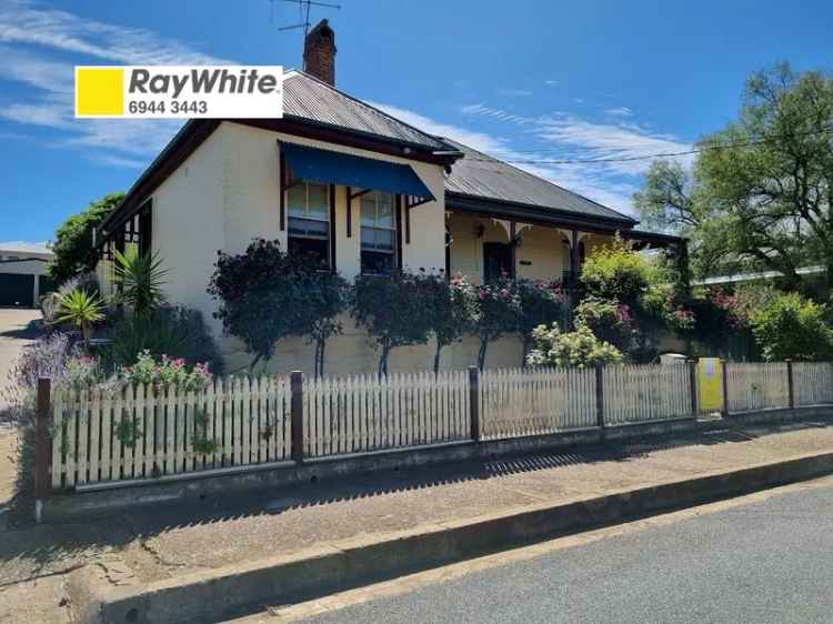 Buy charming home in central location with character features