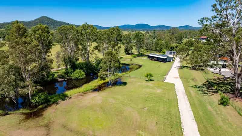 Designer Home On Acreage Property With Town Water