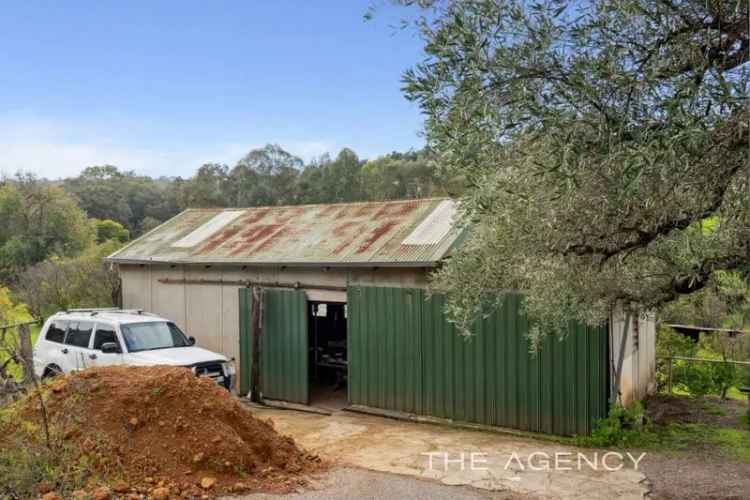 buy rural property near Perth with 3 bedrooms, stunning views and a creek