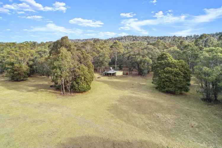 Buy Serene Rural Retreat with 14 Acres of Usable Land and Stunning Features