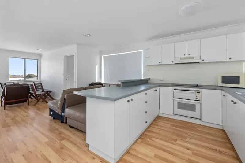 STORM-STRUCK BUT FULL OF SOUL -RENOVATOR'S GEM WITH OCEAN GLIMPSES ON A MASSIVE 910SQM BLOCK