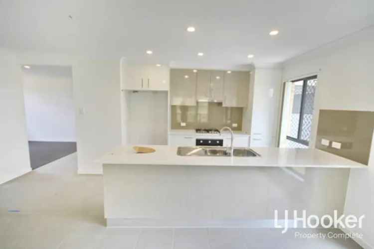 Rent contemporary four bedroom house in Yarrabilba with modern features