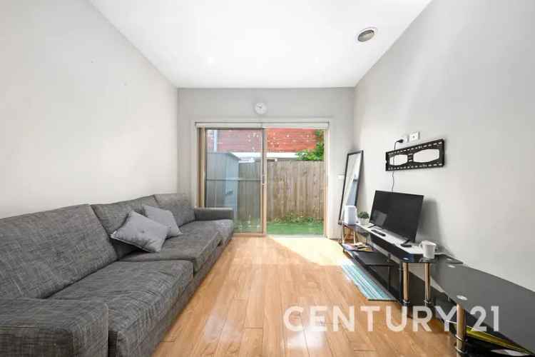 Buy Townhouse in Springvale with Spacious Bedrooms and Private Courtyard