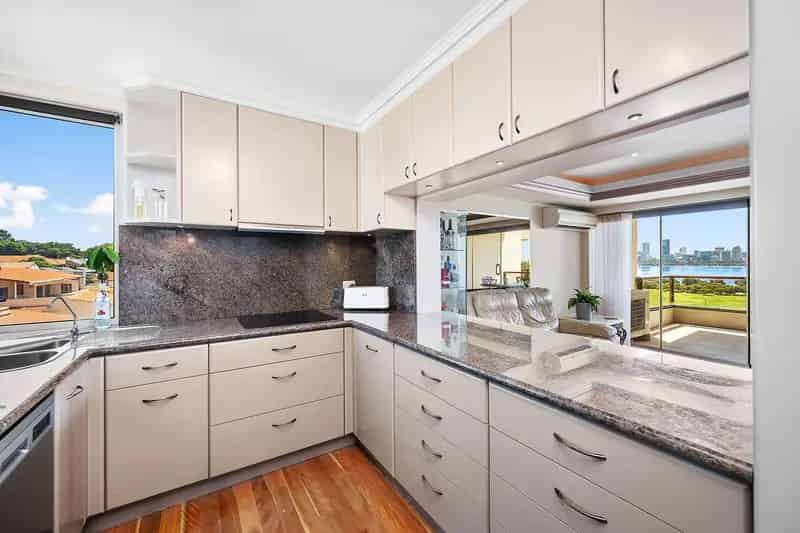 Refined Living with Breathtaking River & City Views