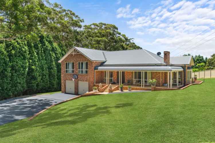 Buy family home land at Avoca Beach with spacious layout and gardens