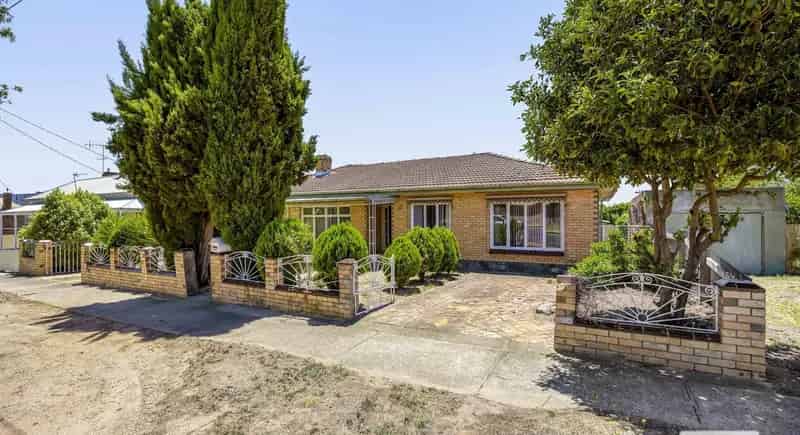 Buy Solid Double Brick Home with Garages in Central Location
