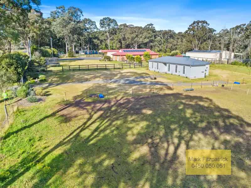 Two Homes For The Price Of One On Acres! A Perfect Blend of Modern Living and Expansive Outdoor Space!