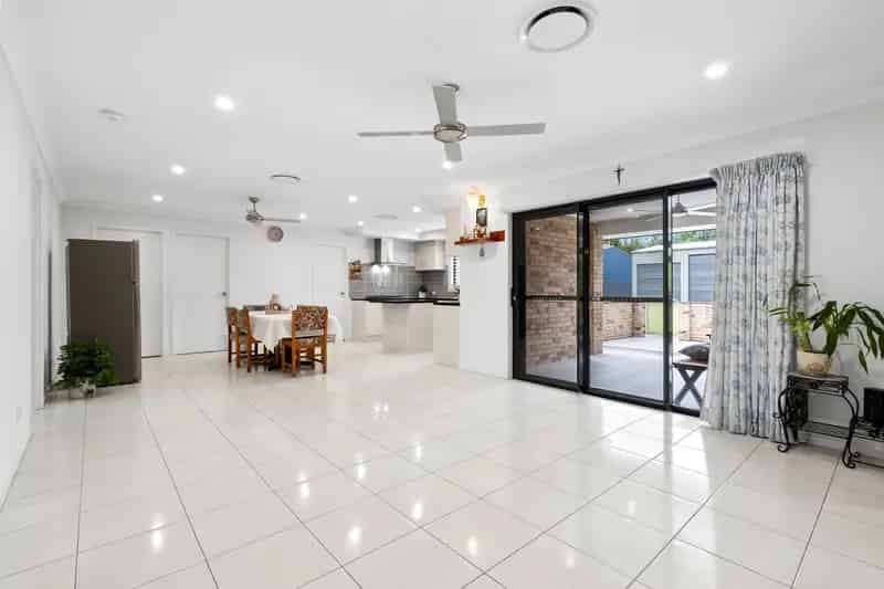 Spacious Acreage Living in Bellmere's Sought-After Location