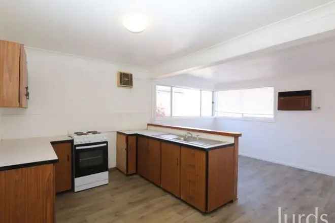 Cute Corner Block Home with Tidy Kitchen and Air Conditioning