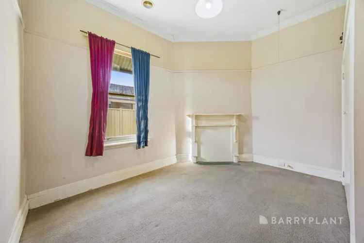 Buy House in City Centre with Three Bedrooms and Potential Features