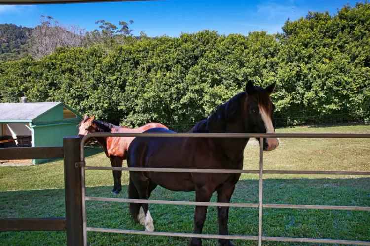 Private and Pristine Acreage Paradise with Equestrian Amenities