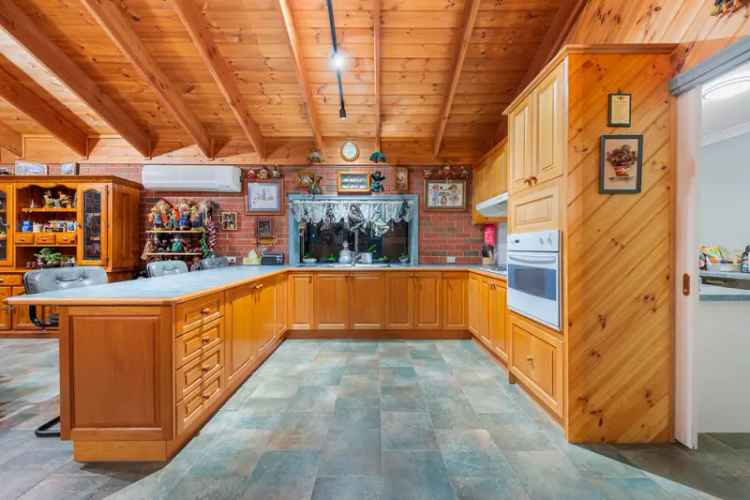 RUSTIC RETREAT WITH ABUNDANT SPACE & ENTERTAINMENT FEATURES