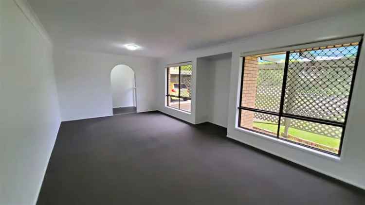 Buy lowset brick house in Brisbane with spacious yard and air conditioning