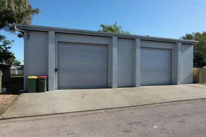 Prime Corner Lot with Workshop and House - Ideal for Business and Residence