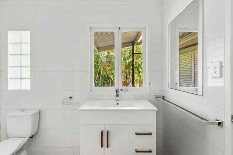 Buy Lowset Home in Bulimba with Tropical Outlook and Modern Features