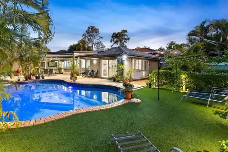 Buy Family House in Robina Waters with Private Pool and Tropical Gardens