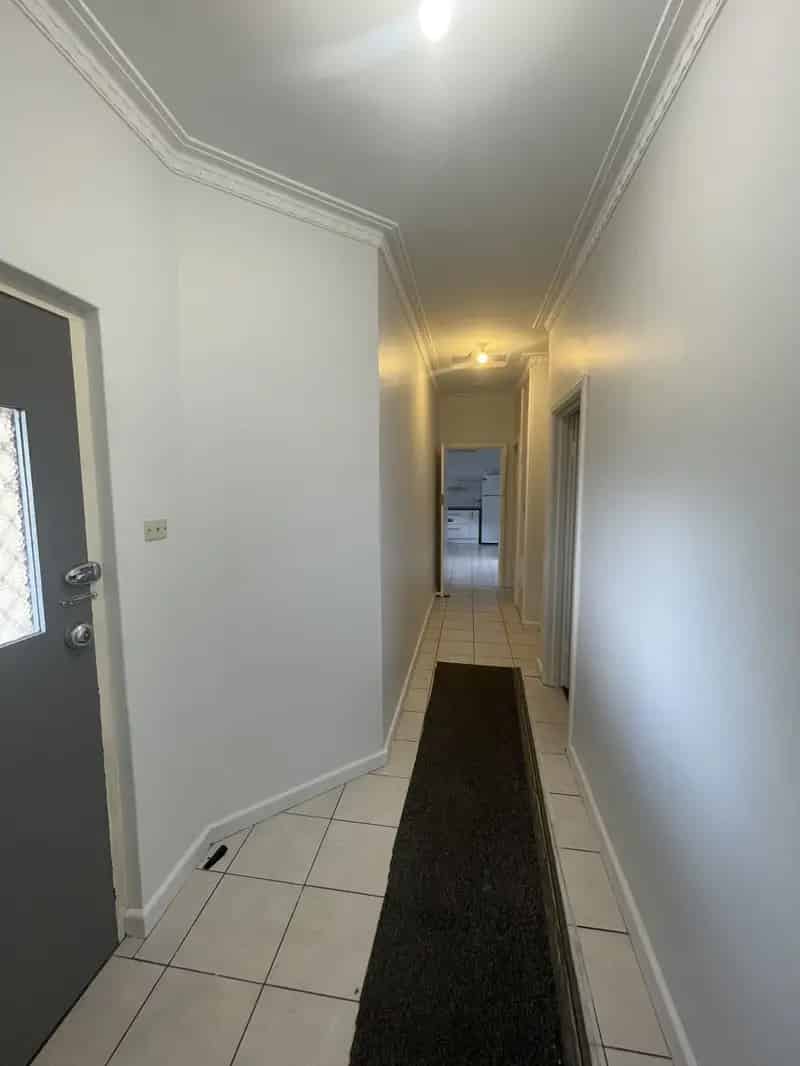 Buy House in Town with Three Bedrooms and Large Backyard Features