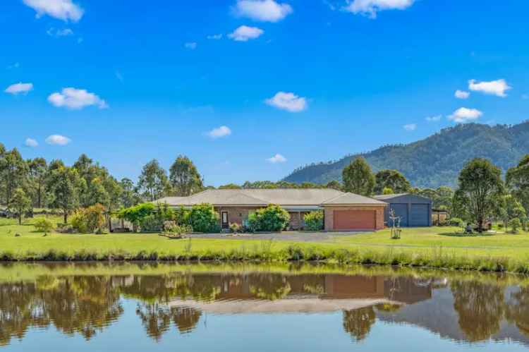 Idyllic 5-Acre Retreat: Spacious Home with Granny Flat & Picturesque Dam