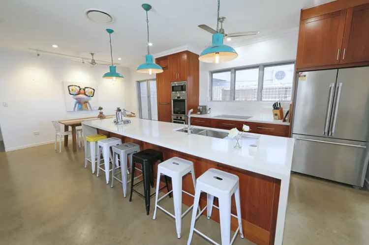 Buy Coastal Home Bargara with Granny Flats and Income Potential