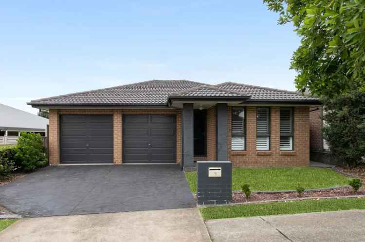 House for sale in Oran Park with spacious backyard and modern features