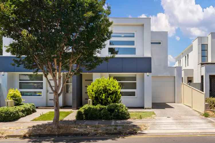 Crisp Campbelltown Townhouse Delivers Downsized Designer Living.