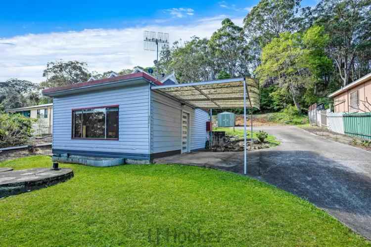 Buy House in Wangi Wangi with Nature Reserve and Water Views