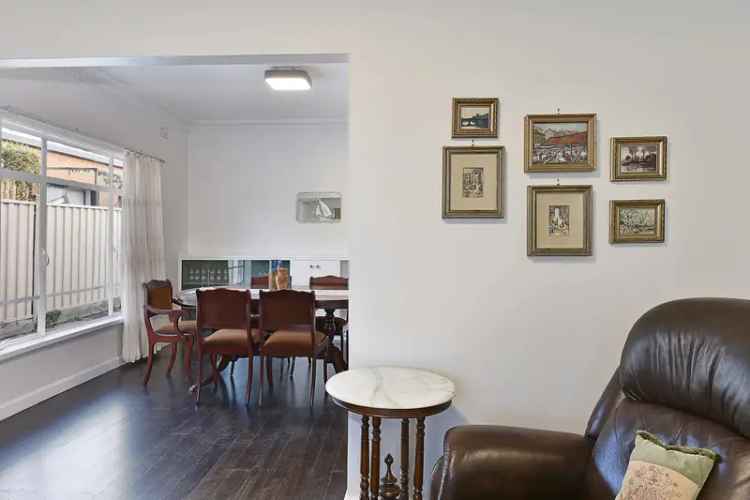 A CLASSIC BRICK HOME IN A PRIME LOCATION 