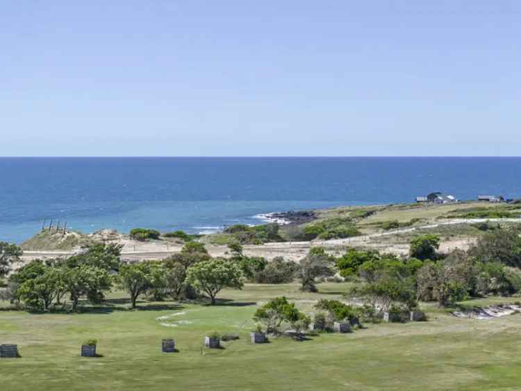 Coastal opportunity with sweeping views across the Golf Course & Ocean