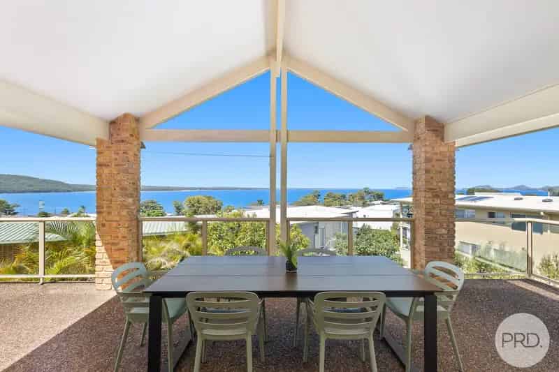 Incredible Home with Stunning Water Views to Impress!
