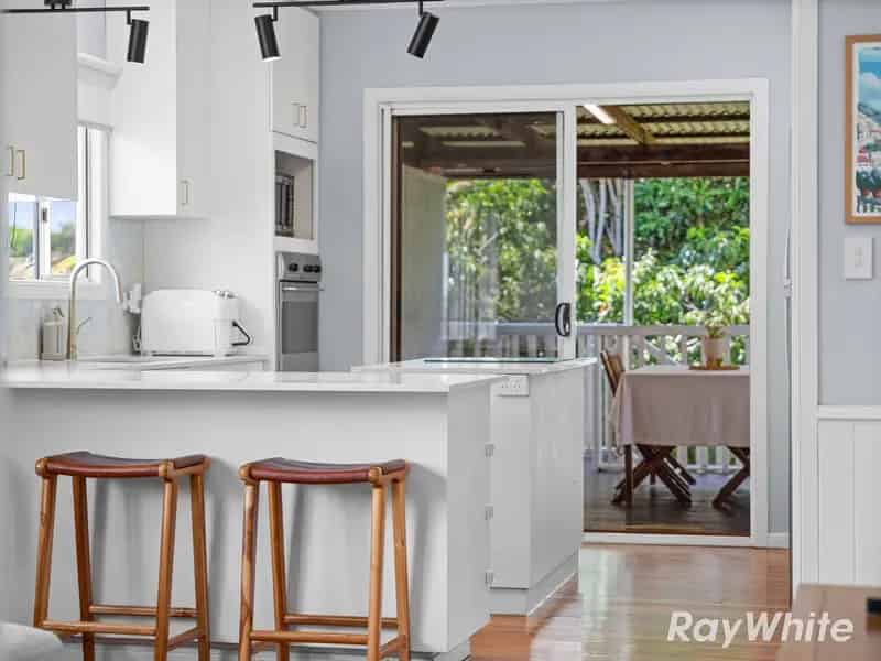 Renovated Queenslander with Spacious Deck and Private Backyard in Prime Mitchelton Location