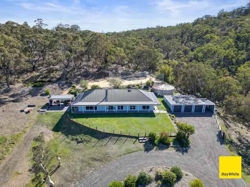 Buy Brick Home with Spectacular Views in Bywong with Tennis Court