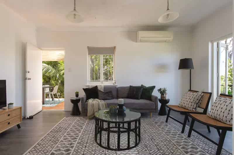 Top-Floor Oasis in Bardon: Urban Living Meets Tranquil Greenery