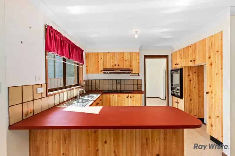 Prime Four-Bedroom Home with Development Potential, Steps from Batemans Bay Waterfront