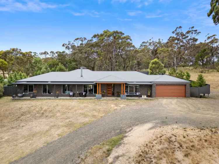 Welcome to the Castle on the Hill of Beaufort, a truly remarkable brick home!