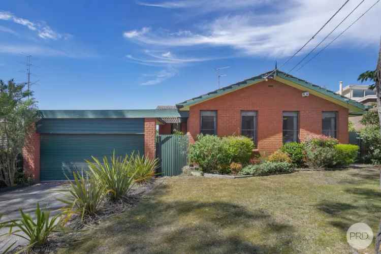 Solid Brick Home with Stunning Views and Endless Potential