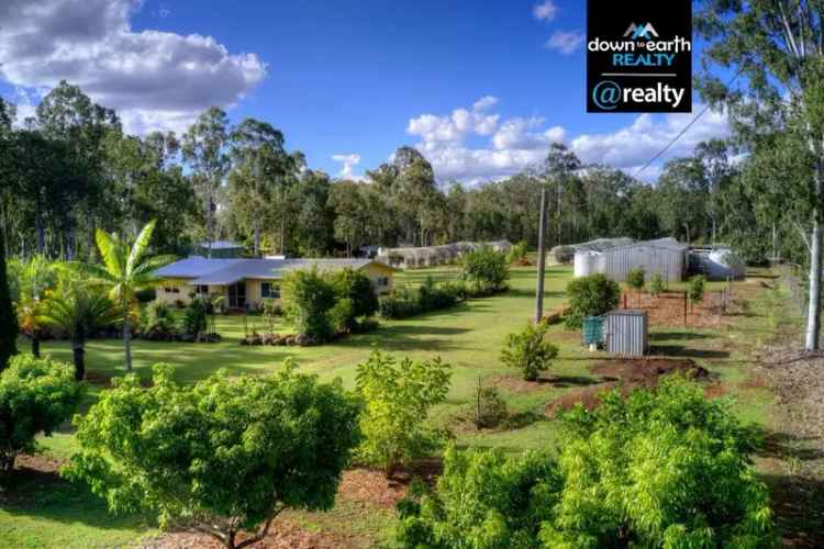 Buy rural property in Ravenshoe with abundant features and orchard