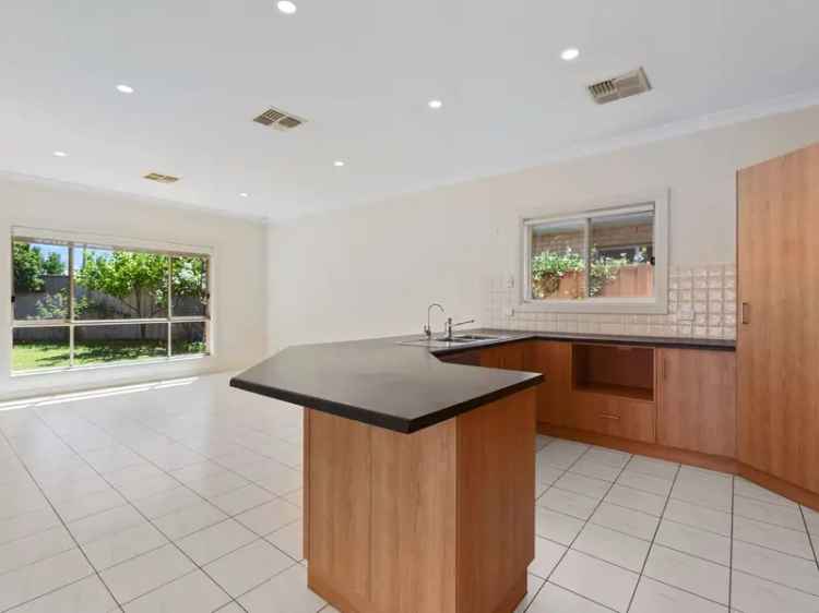 Conveniently located low maintenance home!