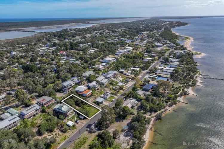 Buy Land in Pelican Bay with Stunning Beach Front Views