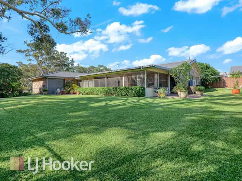 Buy House in Salamander Bay with Parklike Gardens and Modern Features